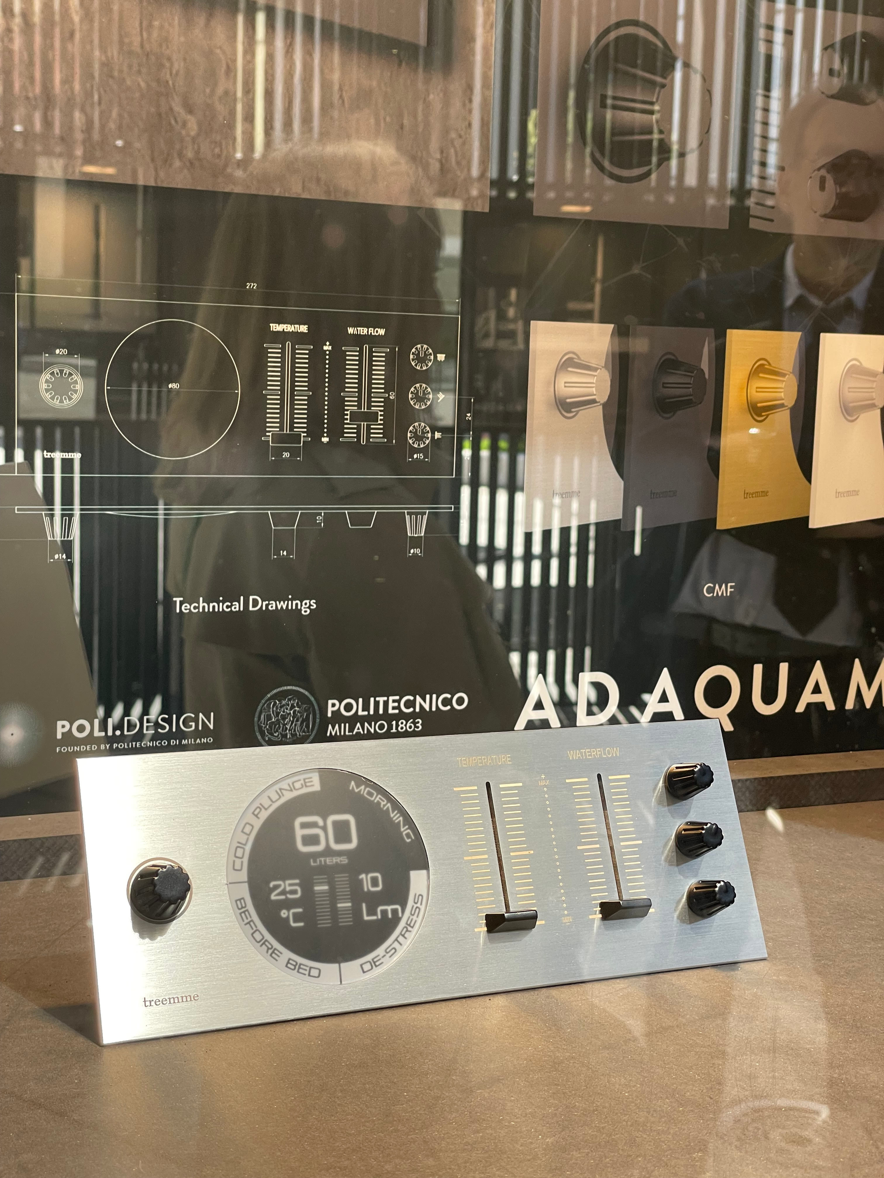 Physical Hypermiler display with a circular screen, two sliders and three knobs in the AD AQUAM exhibition.